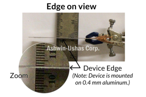 Fully assembled variable emittance skin (“device”)
